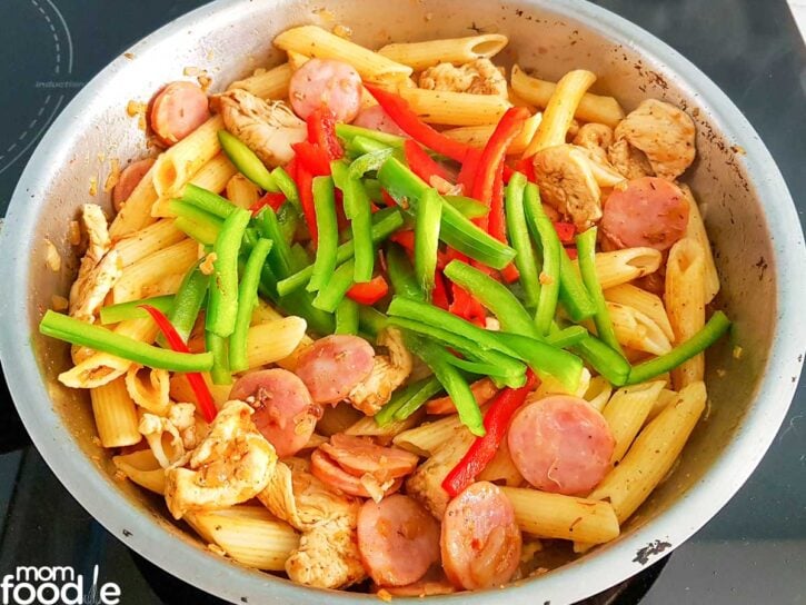 Add the sliced peppers