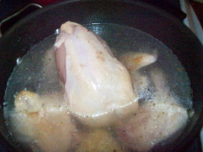 simmering chicken for soup