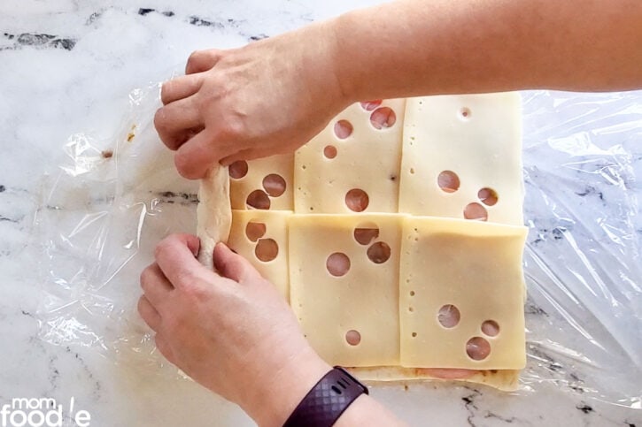 Roll up the ham pinwheels.