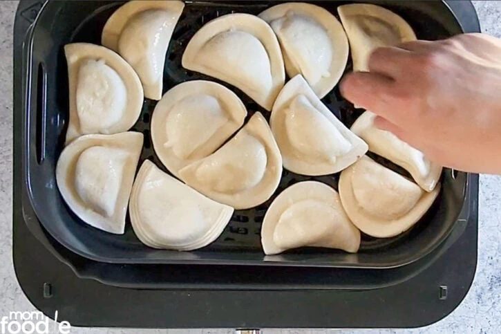 Spreading out frozen pierogies in air fryer basket