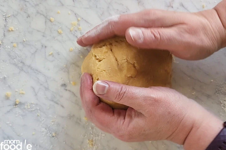 kneading pie dough