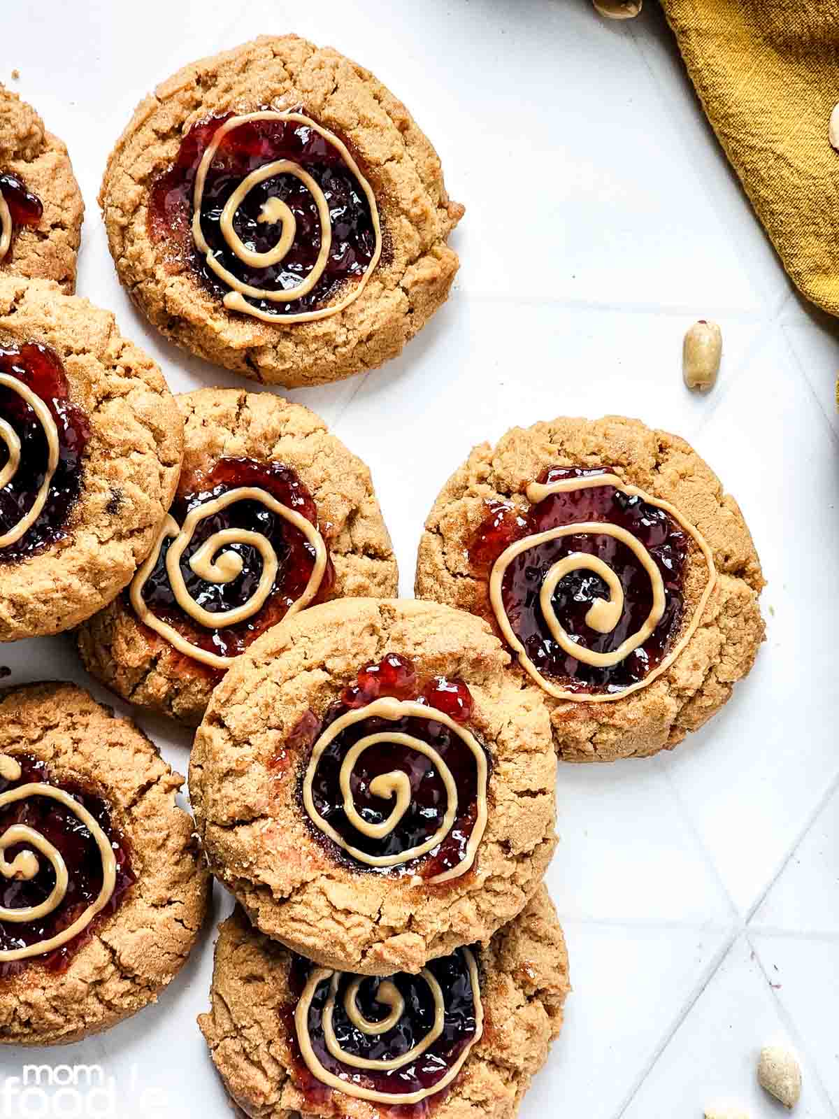 peanut butter and jelly cookies on counter.