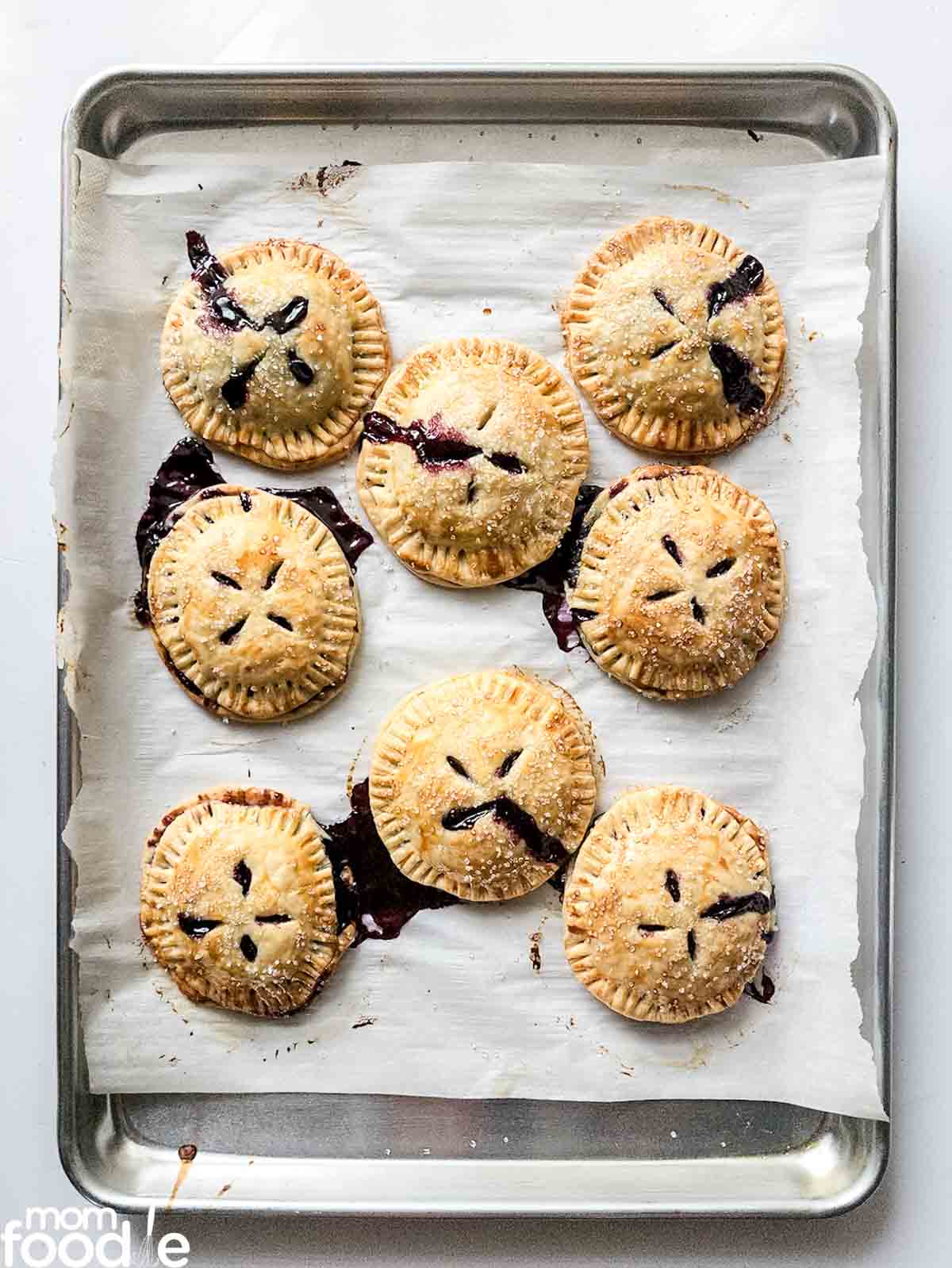 baked blueberry hand pies on sheet pan