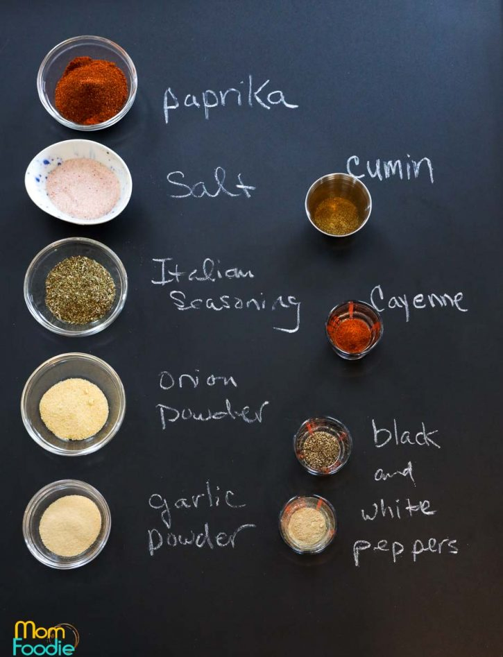 Cajun Seasoning Recipe; paprika, Italian seasoning, cayenne pepper, salt, pepper, onion powder, garlic powder and cumin.
