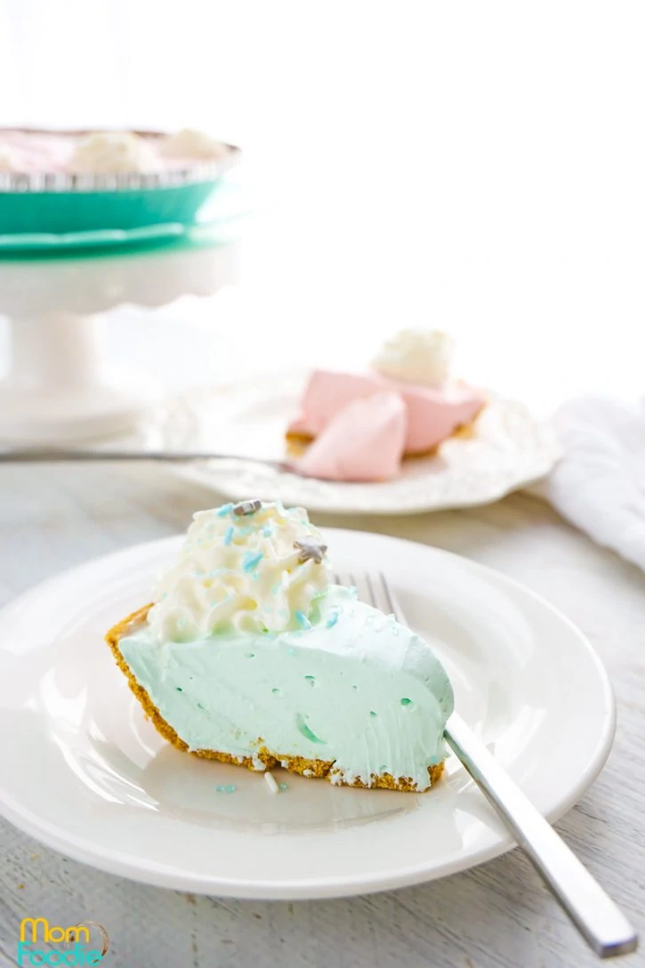 Blue No bake Pie topped with canned or homemade whipped cream