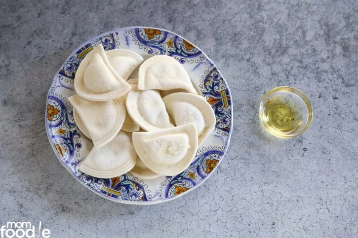 Ingredients for air frying pierogies, frozen pierogies and oil