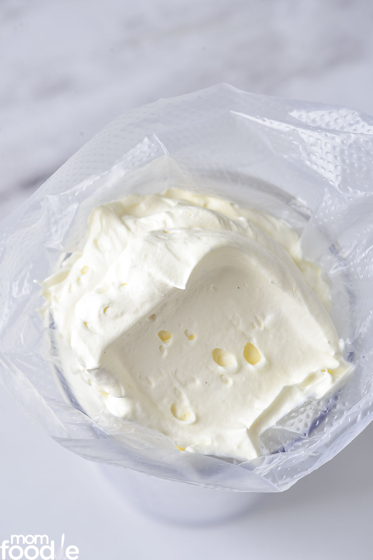 whipped cream in piping bag