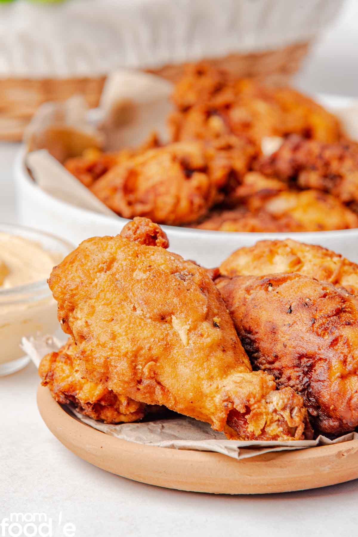 golden brown fried chicken pieces being served.