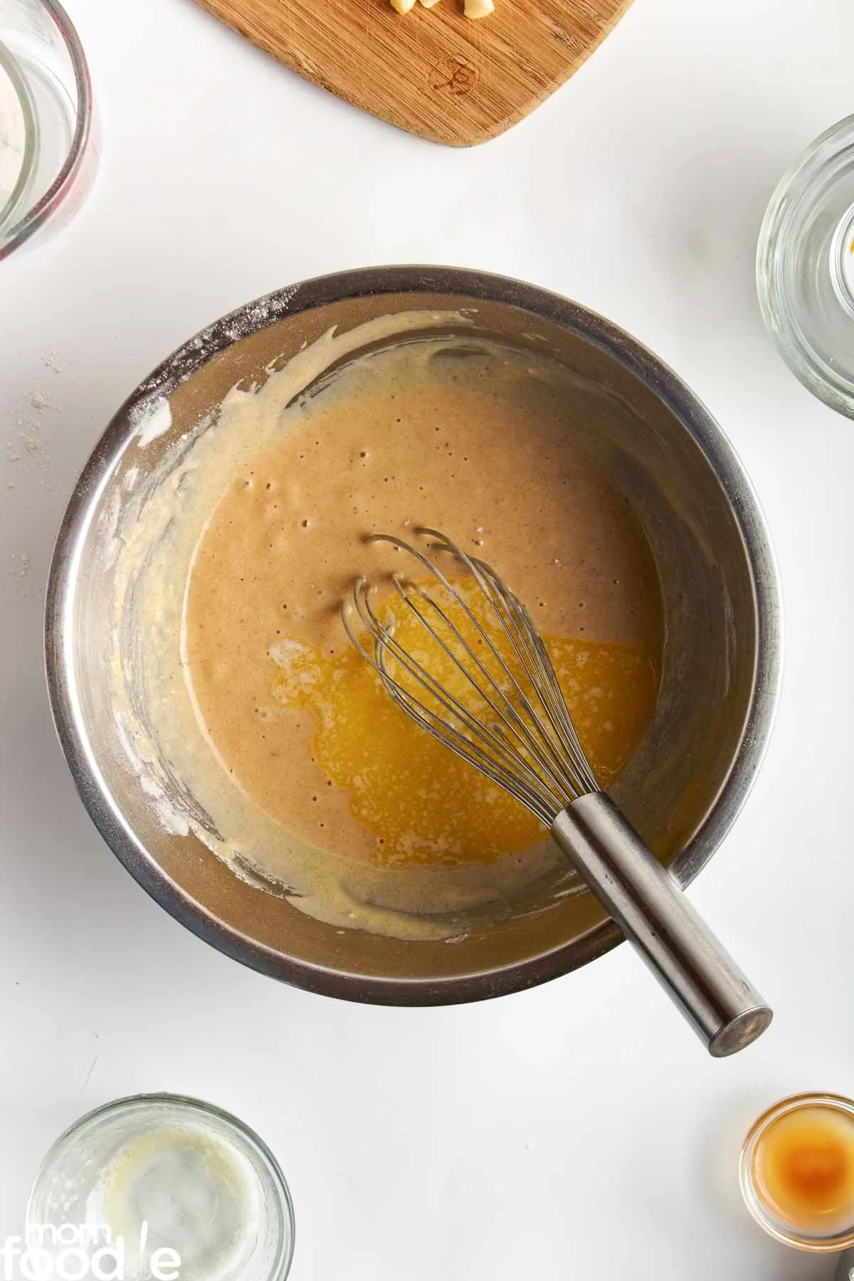 Stir in melted butter into the wet ingredient