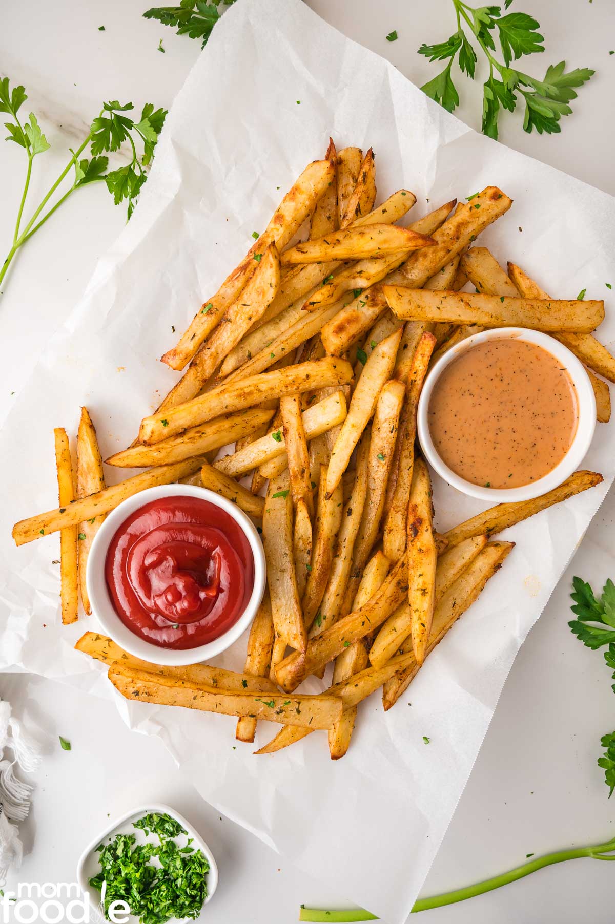 Cajun Fries on serving platter with dipping sauces
