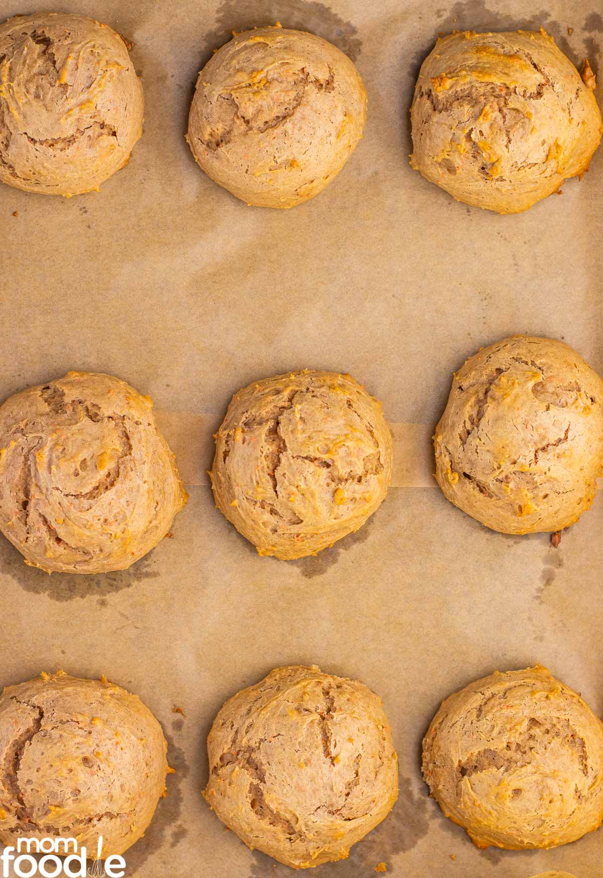 Baked Carrot Cake Mix Cookies on parchment lined baking sheet