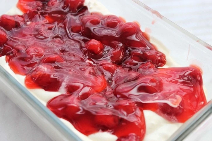Cherry Cheesecake Ice Cream - adding cherries