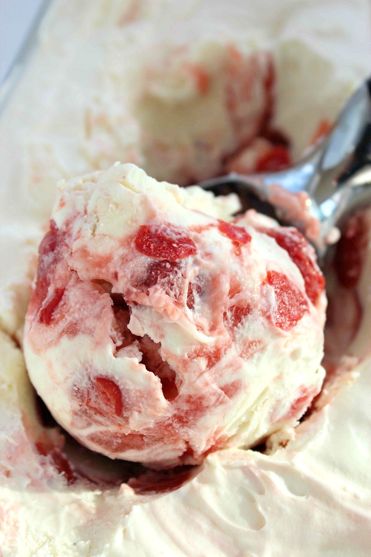 scooping some delicious Cherry cheesecake Ice Cream 