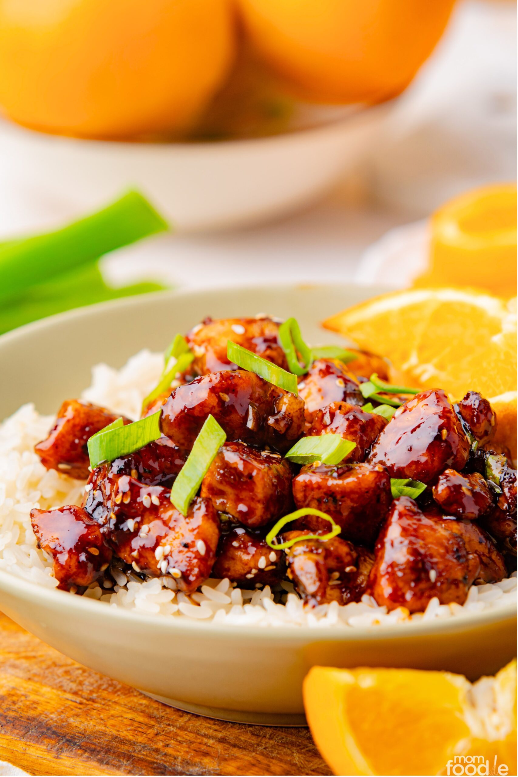 Chinese Orange Chicken in bowl over rice