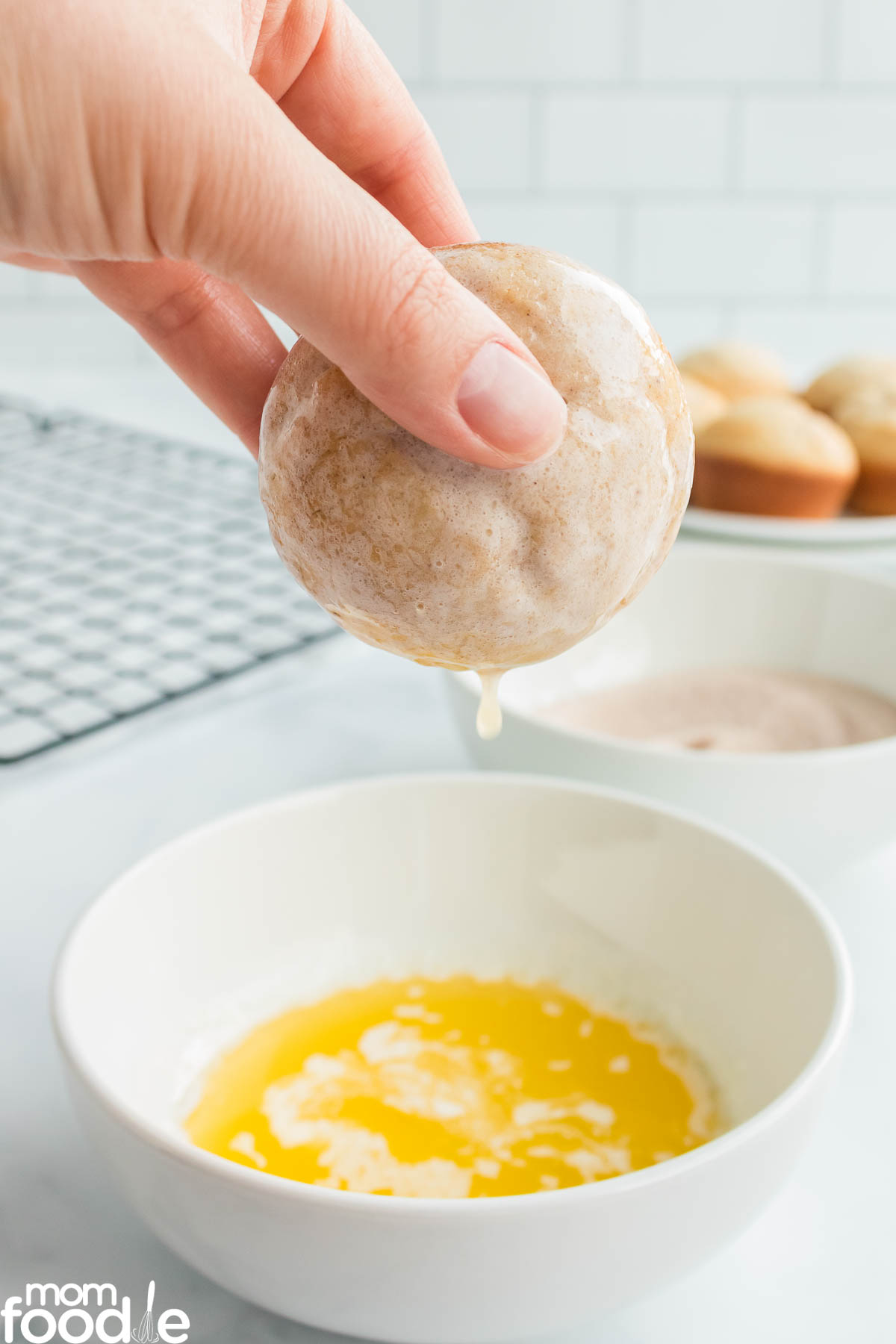 dunking muffin in melted butter.