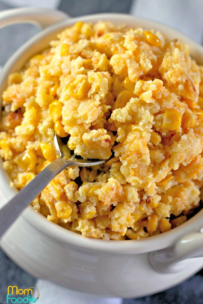 Crock Pot Corn Casserole being served.