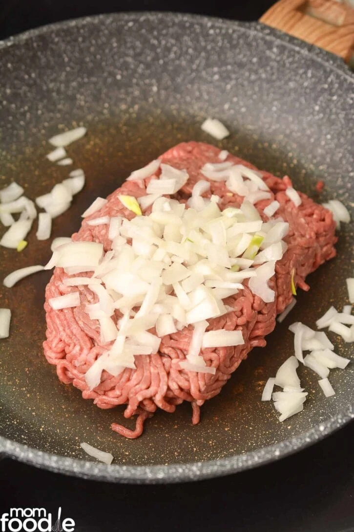 hamburger and onions in skillet