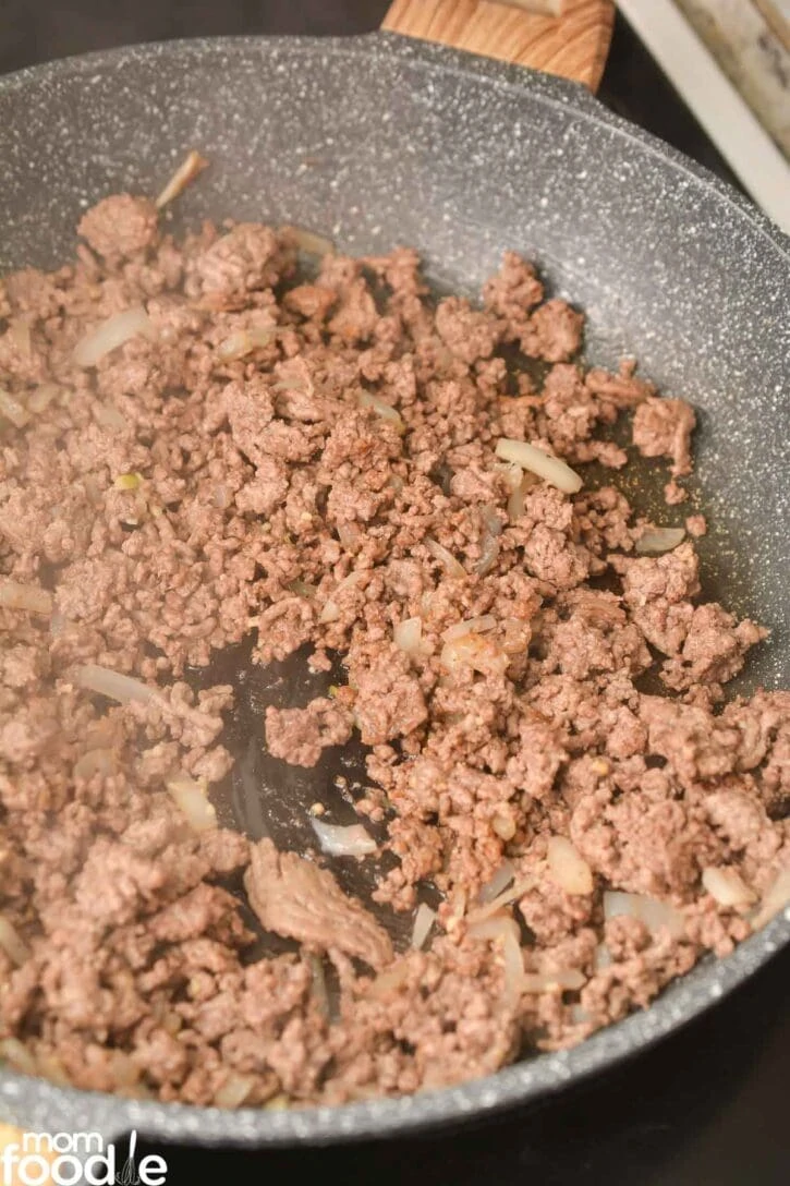 browned ground beef with onions and garlic.