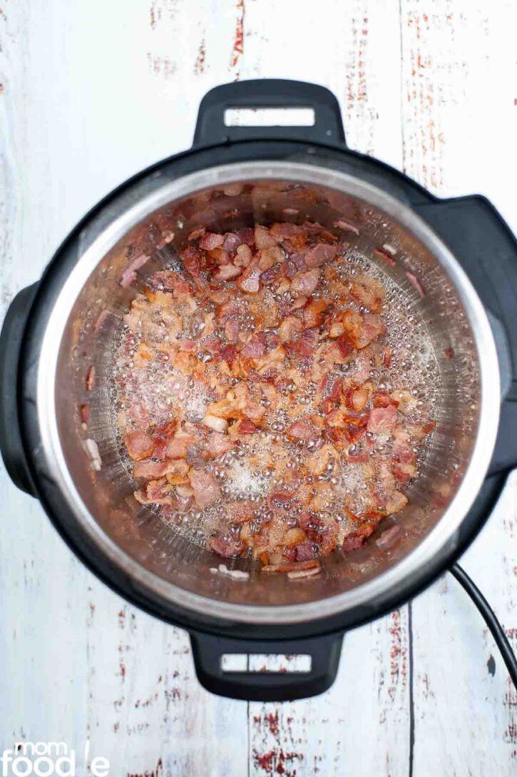Frying bacon bits in Instant Pot on saute function.