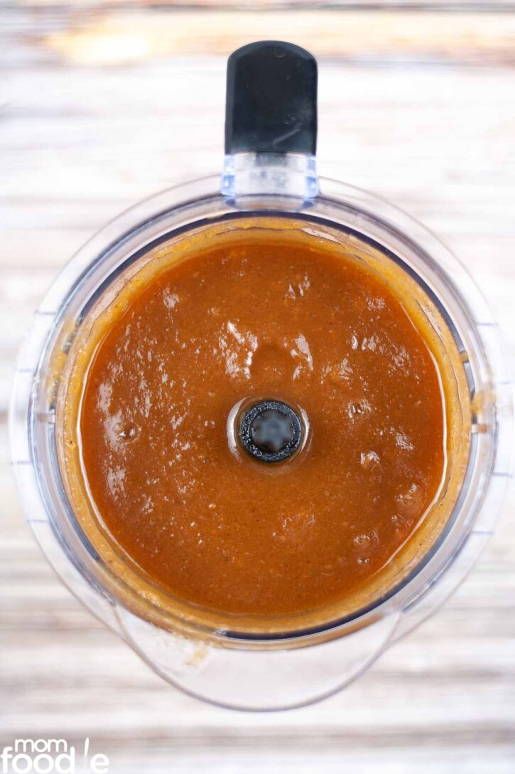 Blending the apple butter until smooth and silky.