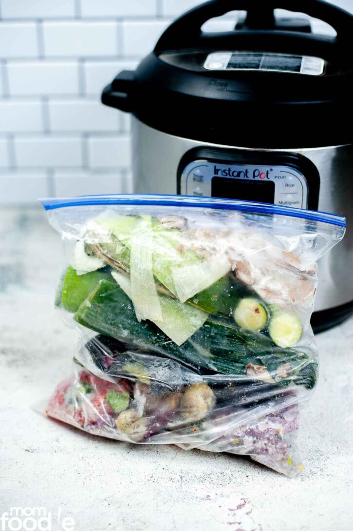 vegetables for soup stock in front of Instant Pot.
