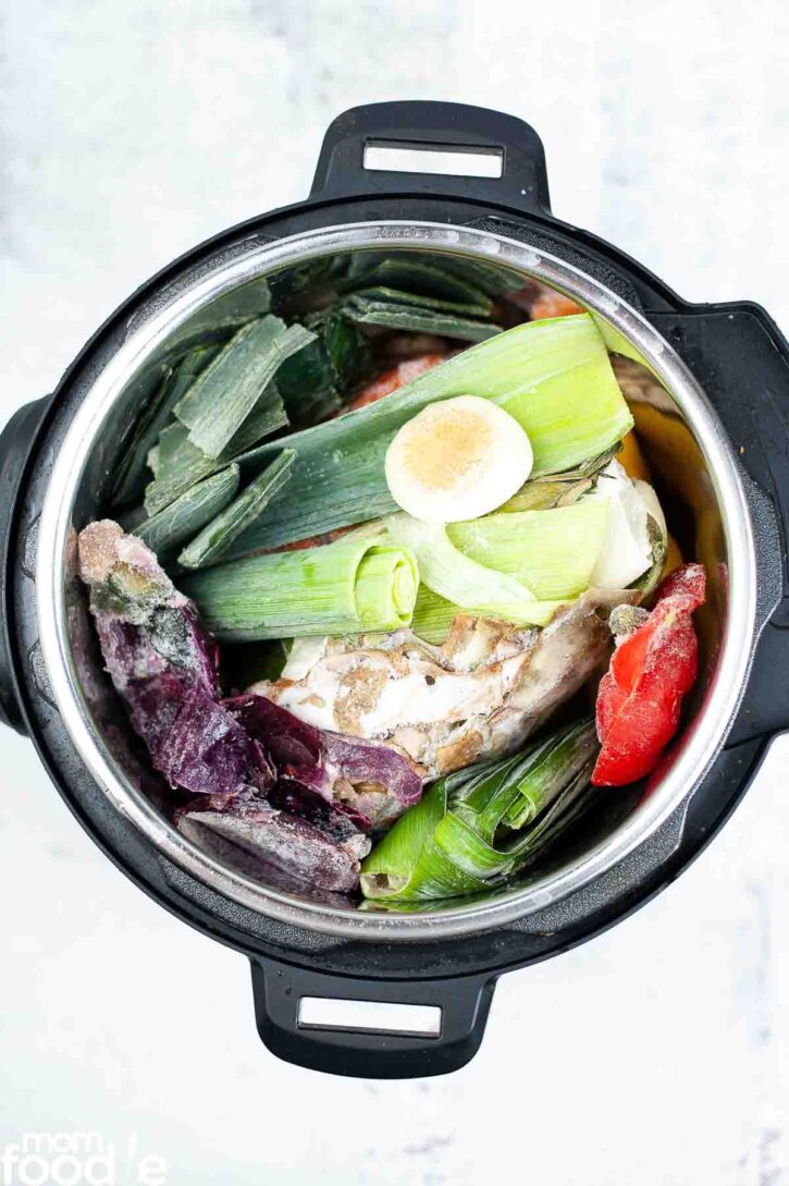 vegetables in Instant pot ready to make broth.