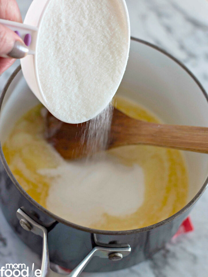 add sugar to melted butter.