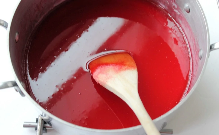 cook strawberry flavored gelatin mixture until dissolved and thickened