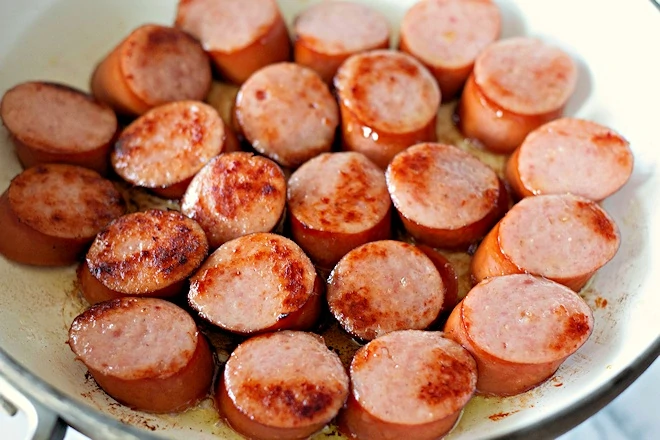 Frying kielbasa