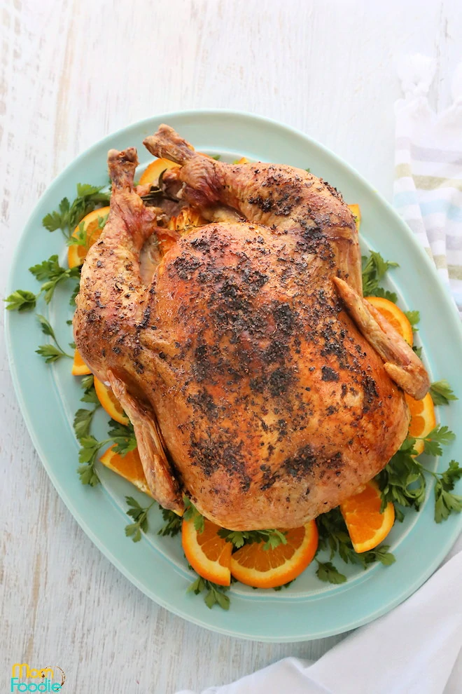 https://momfoodie.com/wp-content/uploads/Herb-Roasted-Turkey-with-Orange.webp