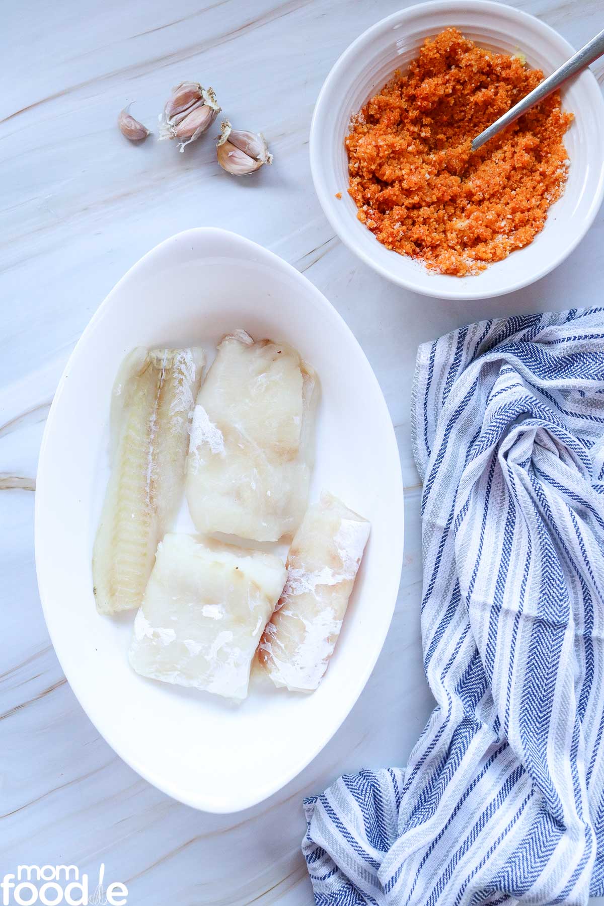 dry the cod fish, place in baking dish and season with salt and pepper