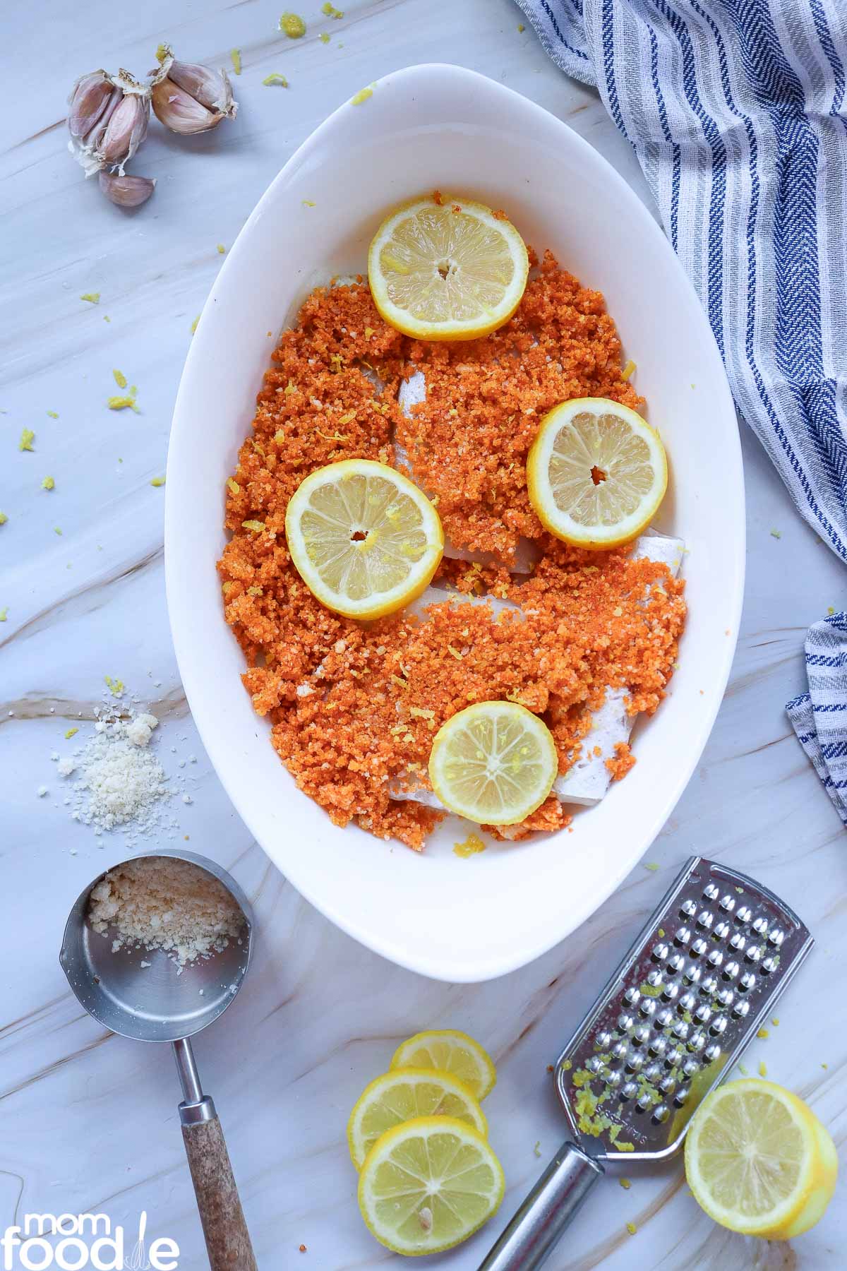 Press the topping onto the cod fillets