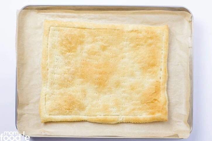 golden brown puff pastry pizza crust