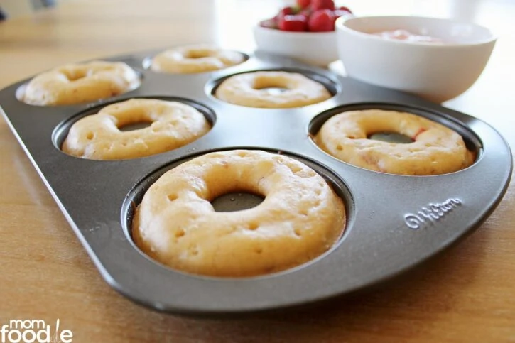homemade strawberry donuts in pan