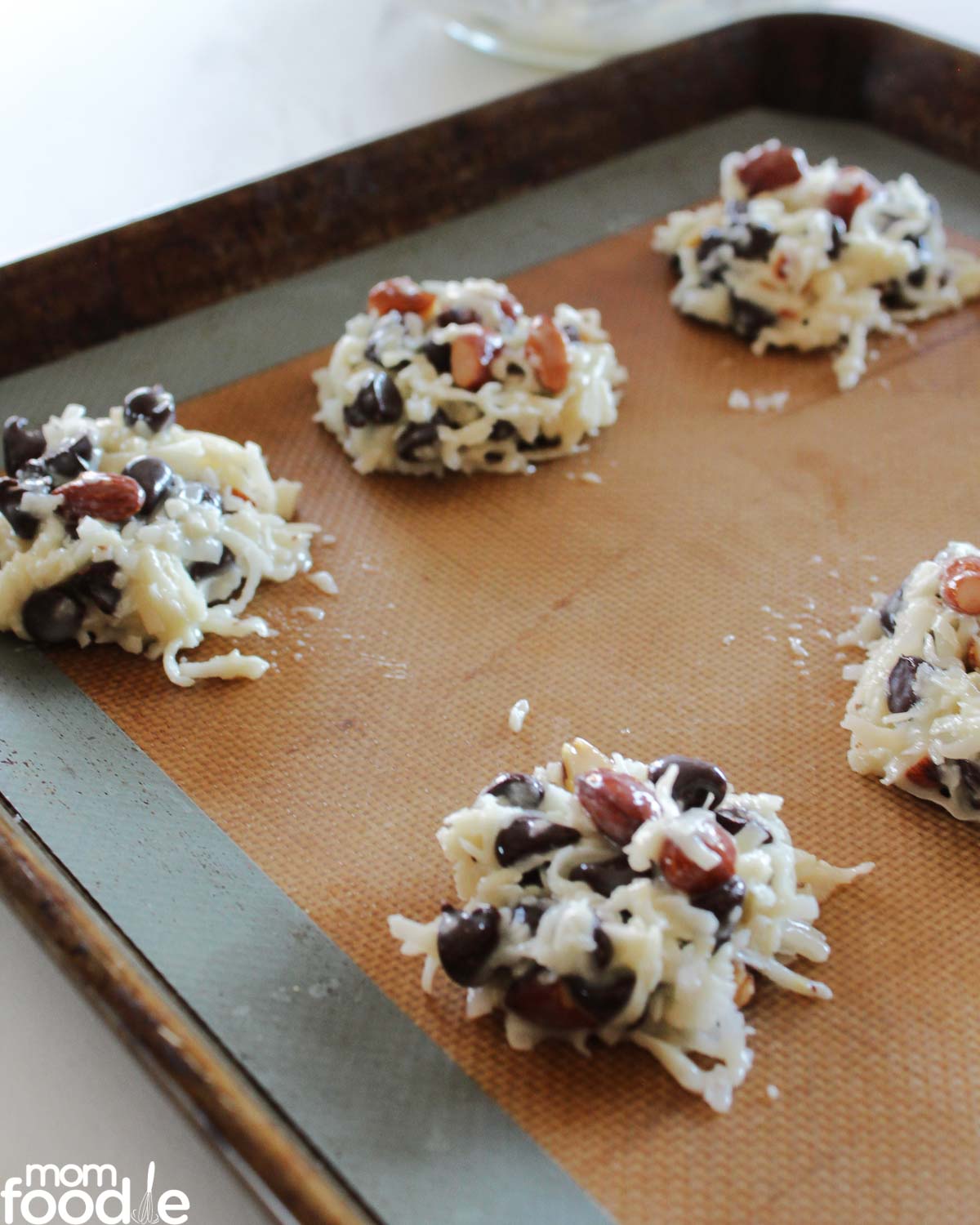 scooped cookies on lined baking sheet.
