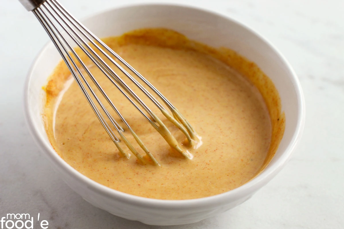 stir the sauce together with a whisk