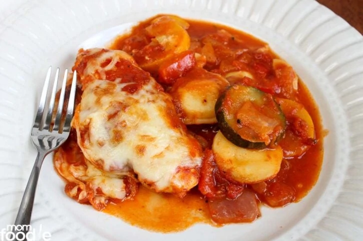 Chicken and Cheese Ravioli Bake wit Italian vegetables on plate. 