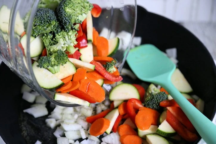 sauteing vegetables in skillet