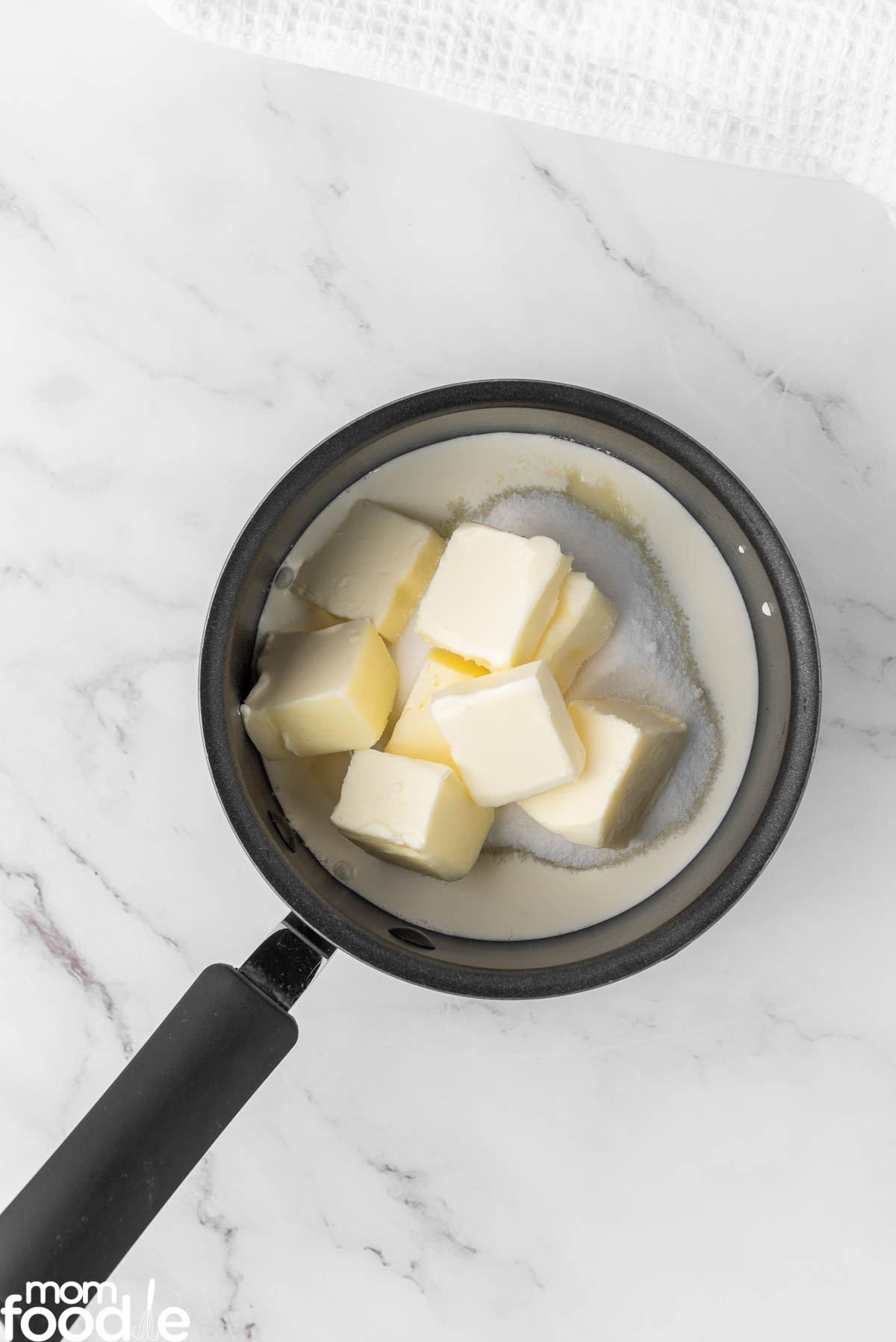 making the eggnog bread pudding sauce
