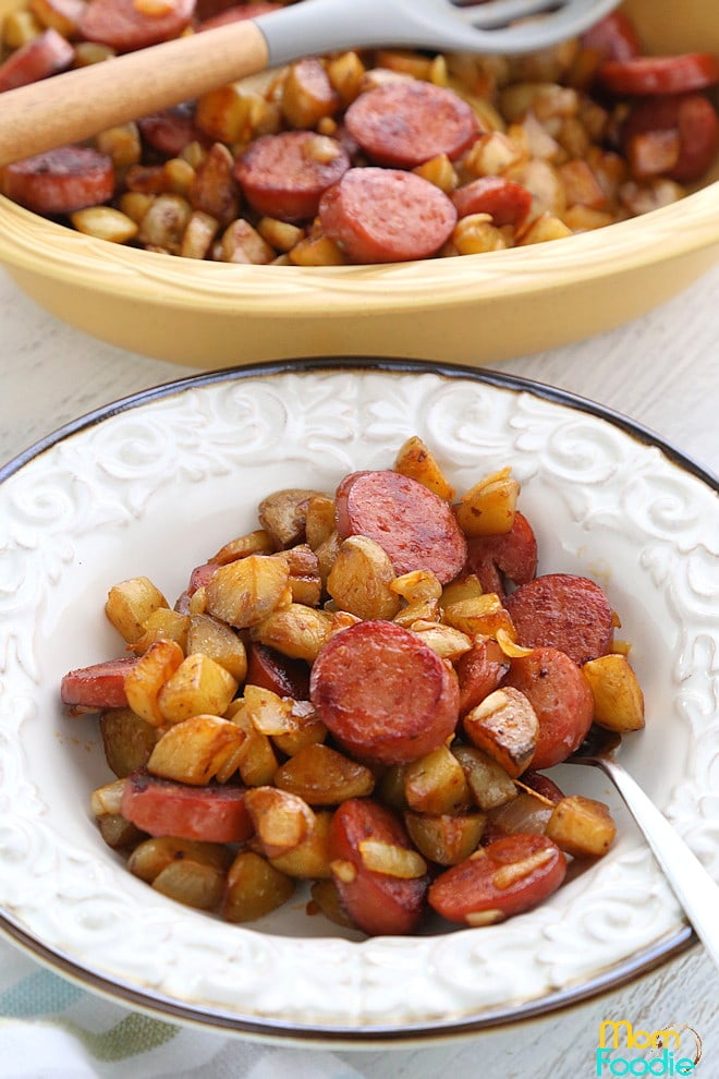 Kielbasa recipe with potatoes  served in white bowl