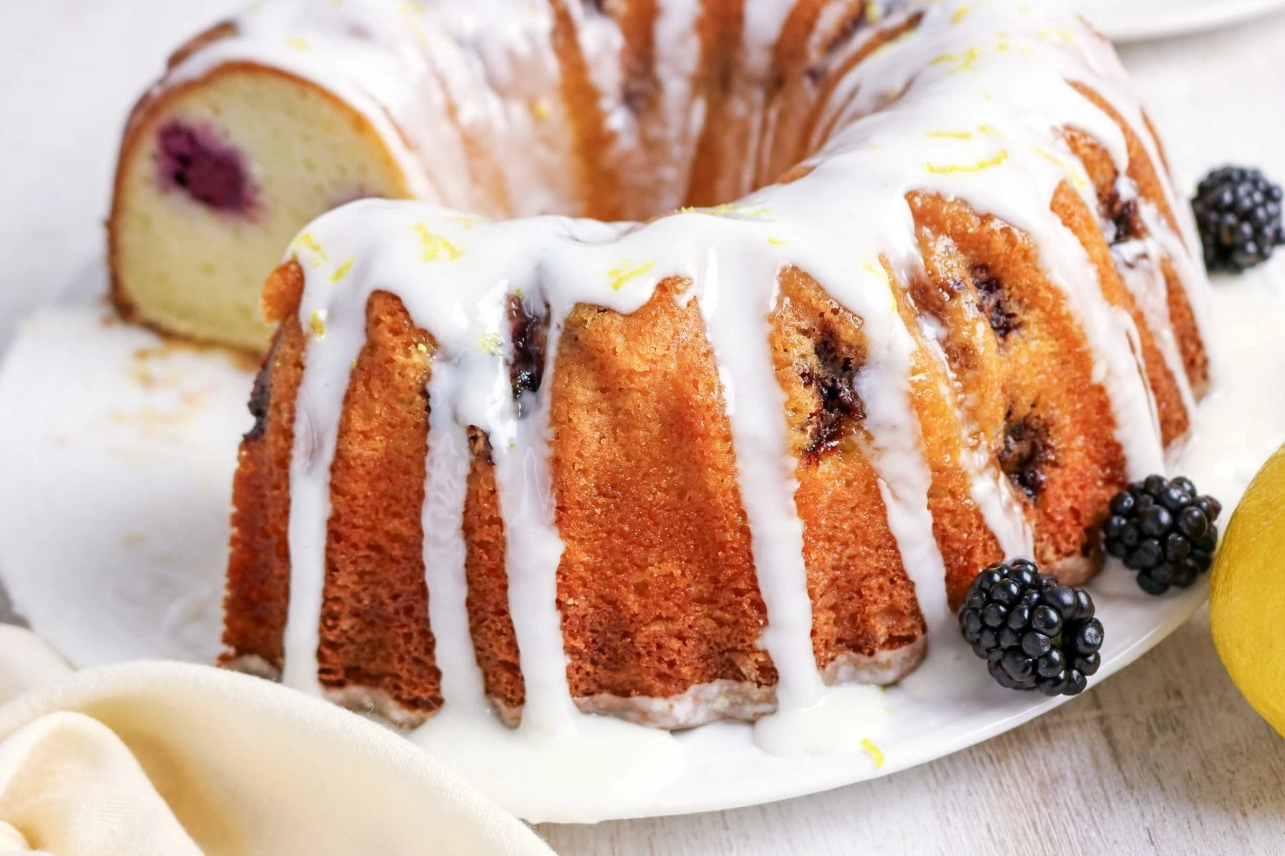 Lemon blackberry cake with lemon glaze