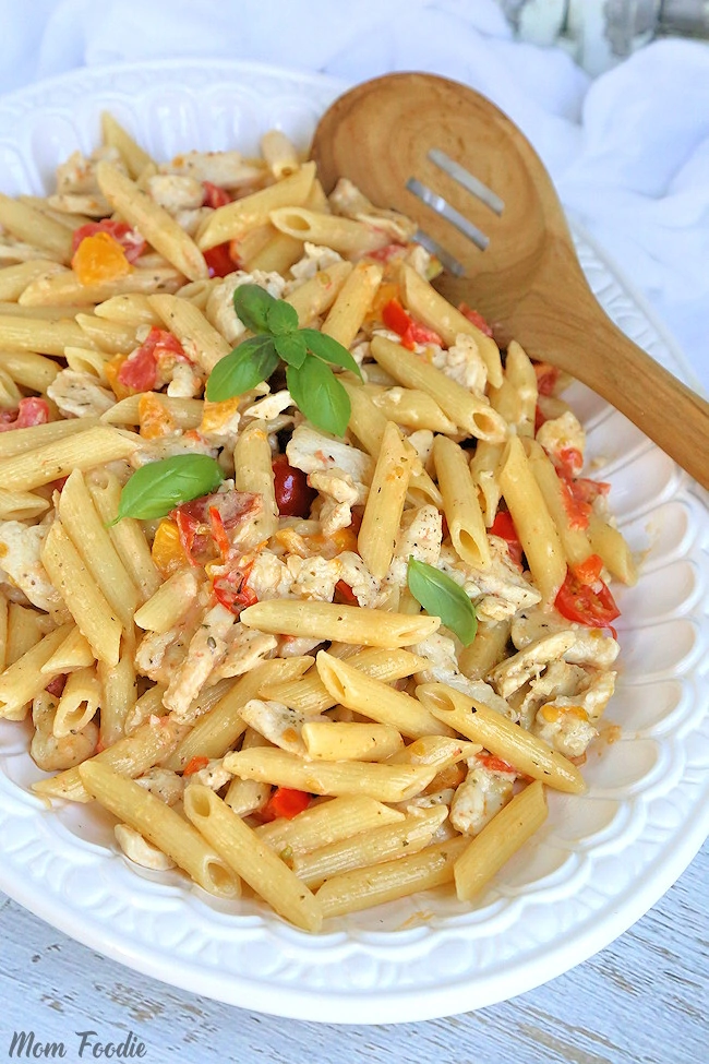 Pasta and Chicken with tomato cream sauce