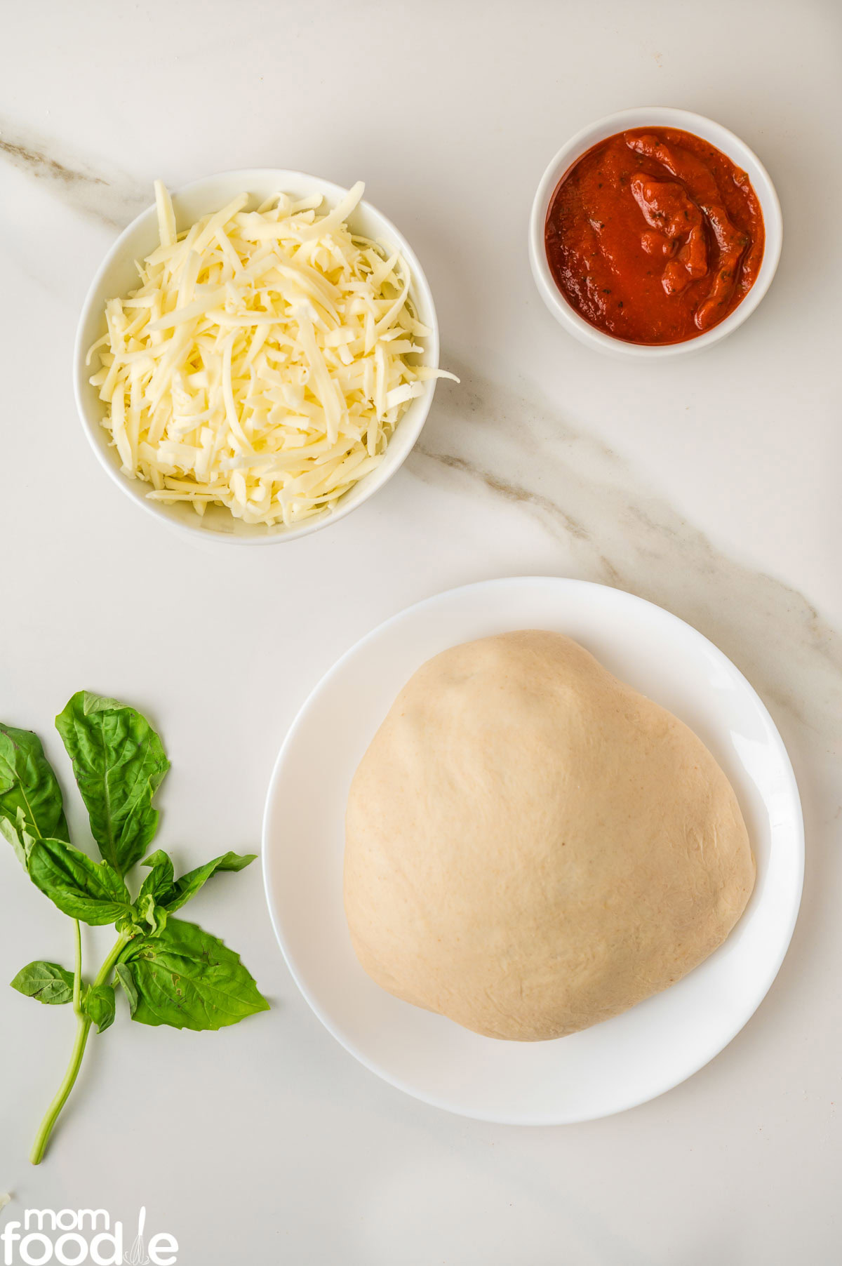ingredients for pizza bites in muffin tin