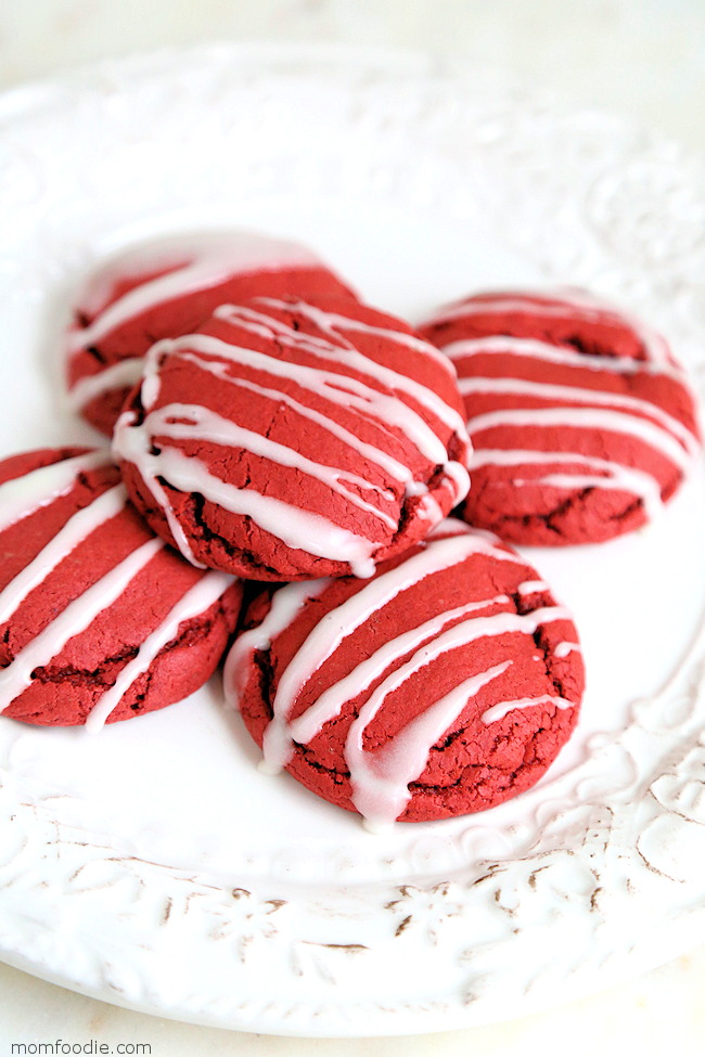 Red Velvet Cake Mix Cookies with icing on plate.