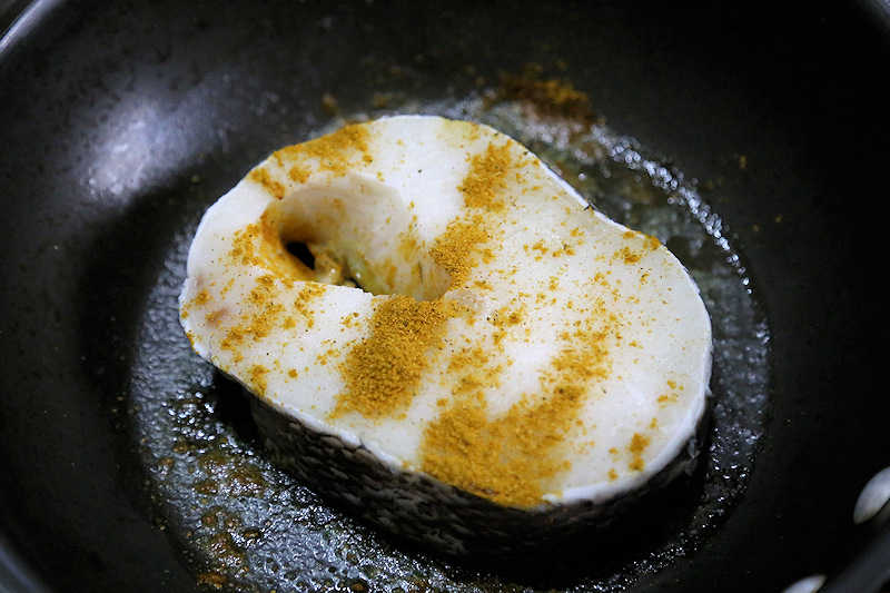 Chilean Sea Bass with Curry in skillet