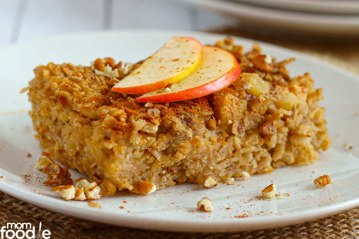 apple cinnamon baked oatmeal with  melted butter and sliced apples on top