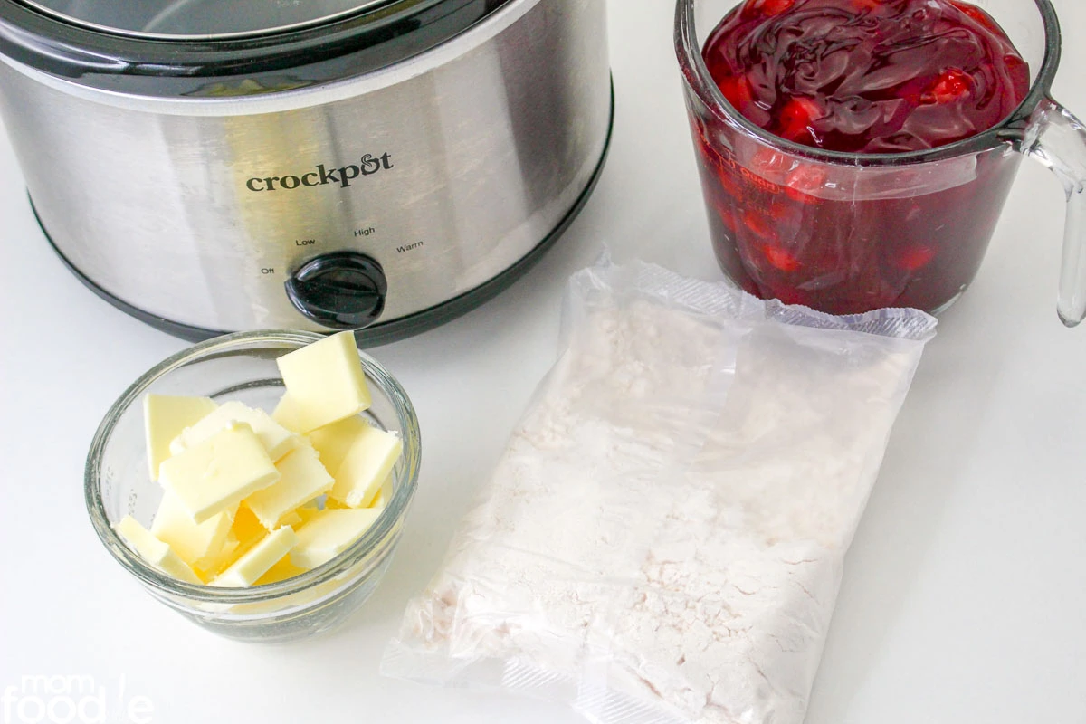 https://momfoodie.com/wp-content/uploads/Slow-Cooker-3-Ingredient-Cherry-Dump-Cake-2-2.webp