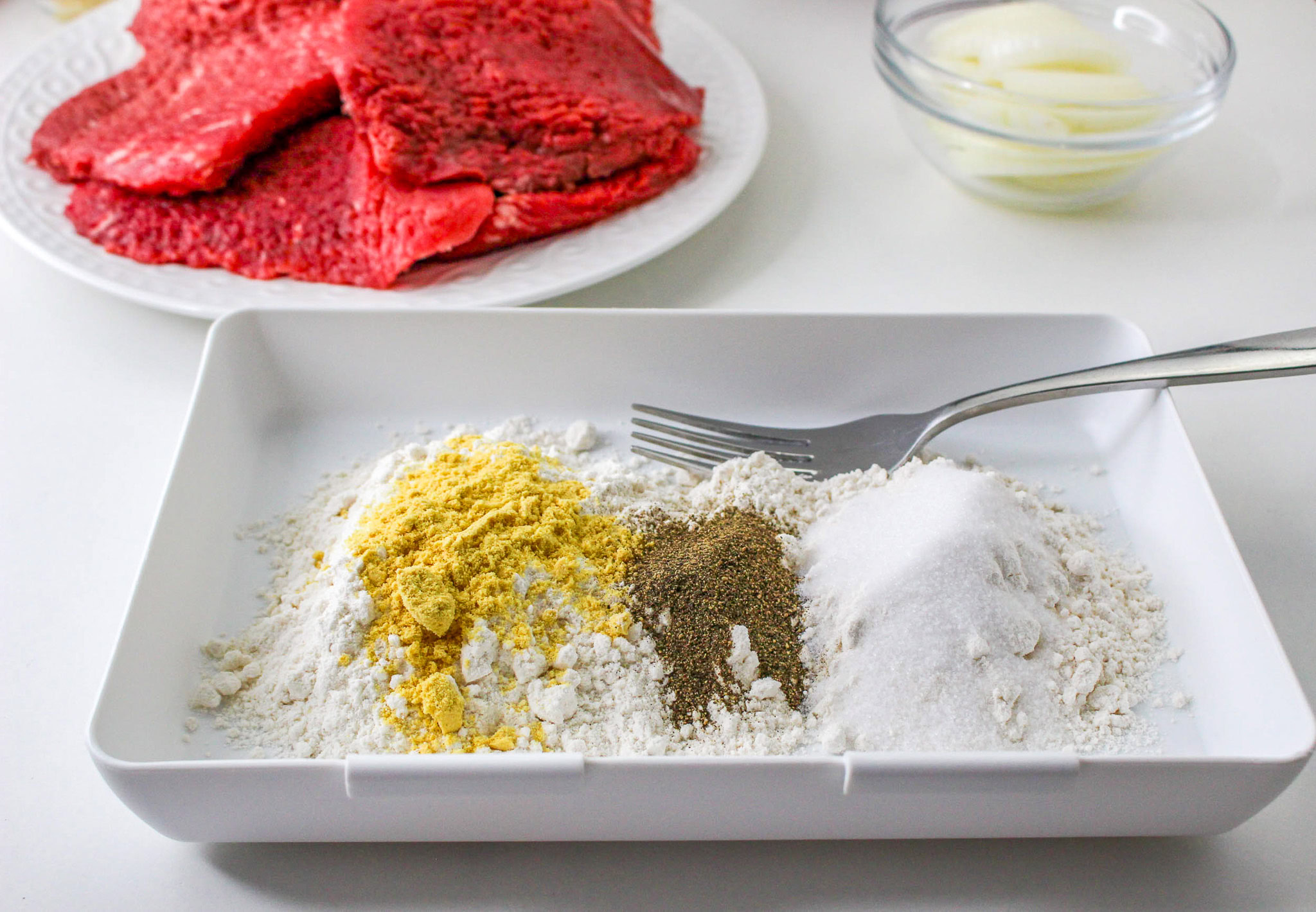 flour and seasonings to coat cube steak