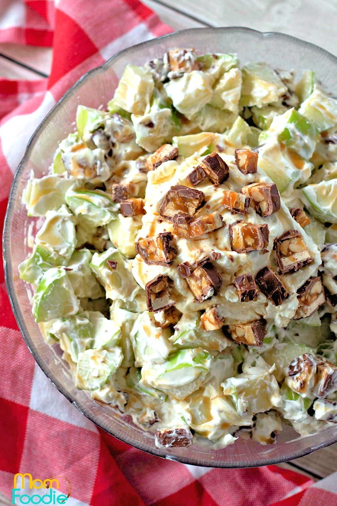 Apple Snickers Salad recipe served in large bowl.