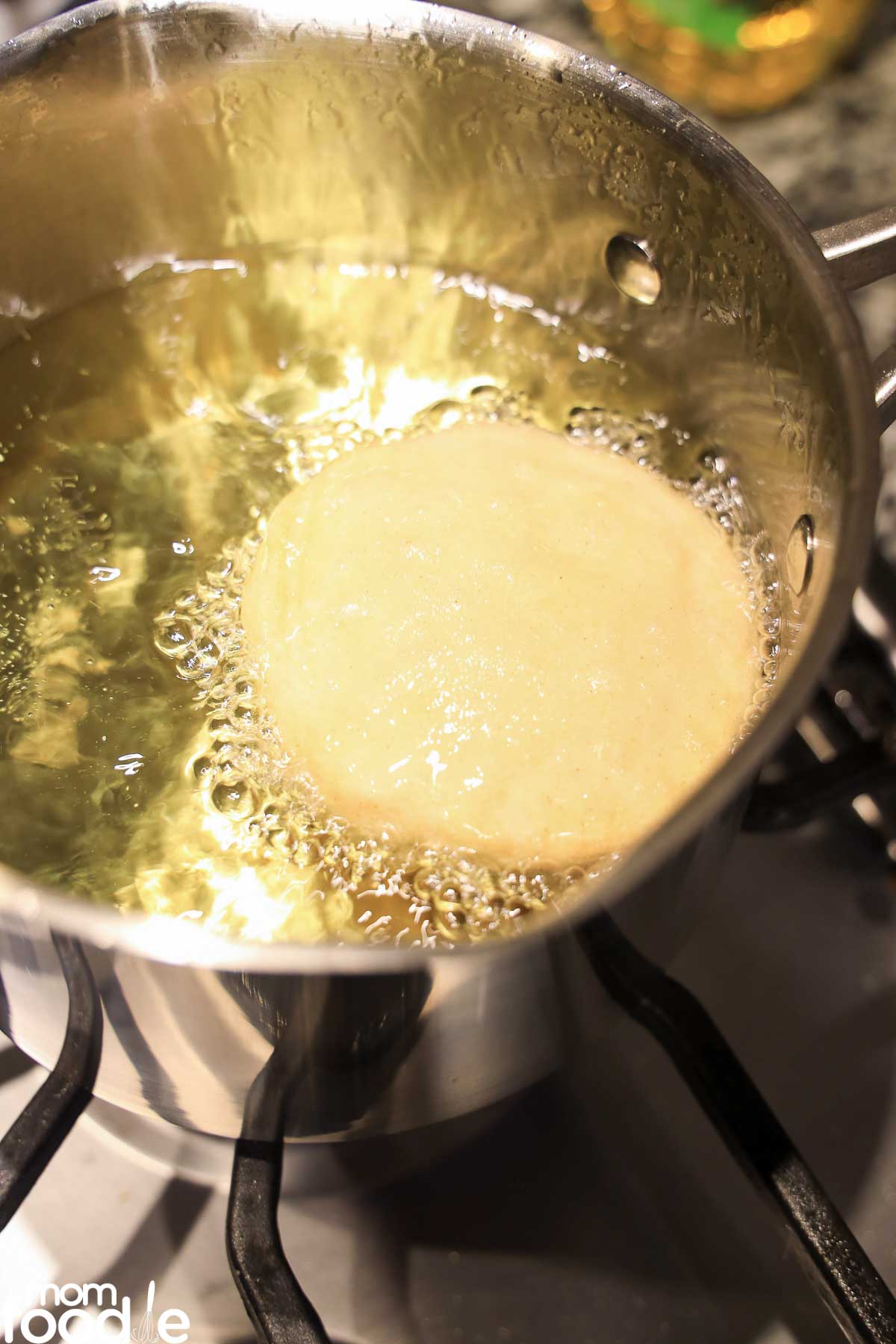 Frying Sopes in oil.
